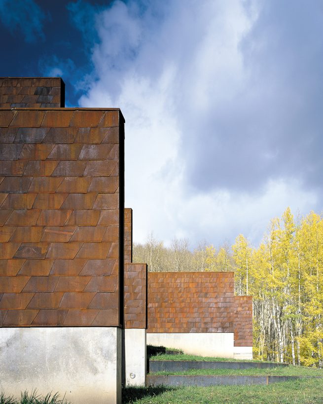 Cor-Ten steel walls protruding into landscape