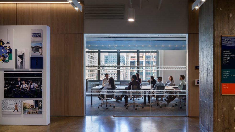 meeting room in use viewed from corridor where Harry's history is displayed