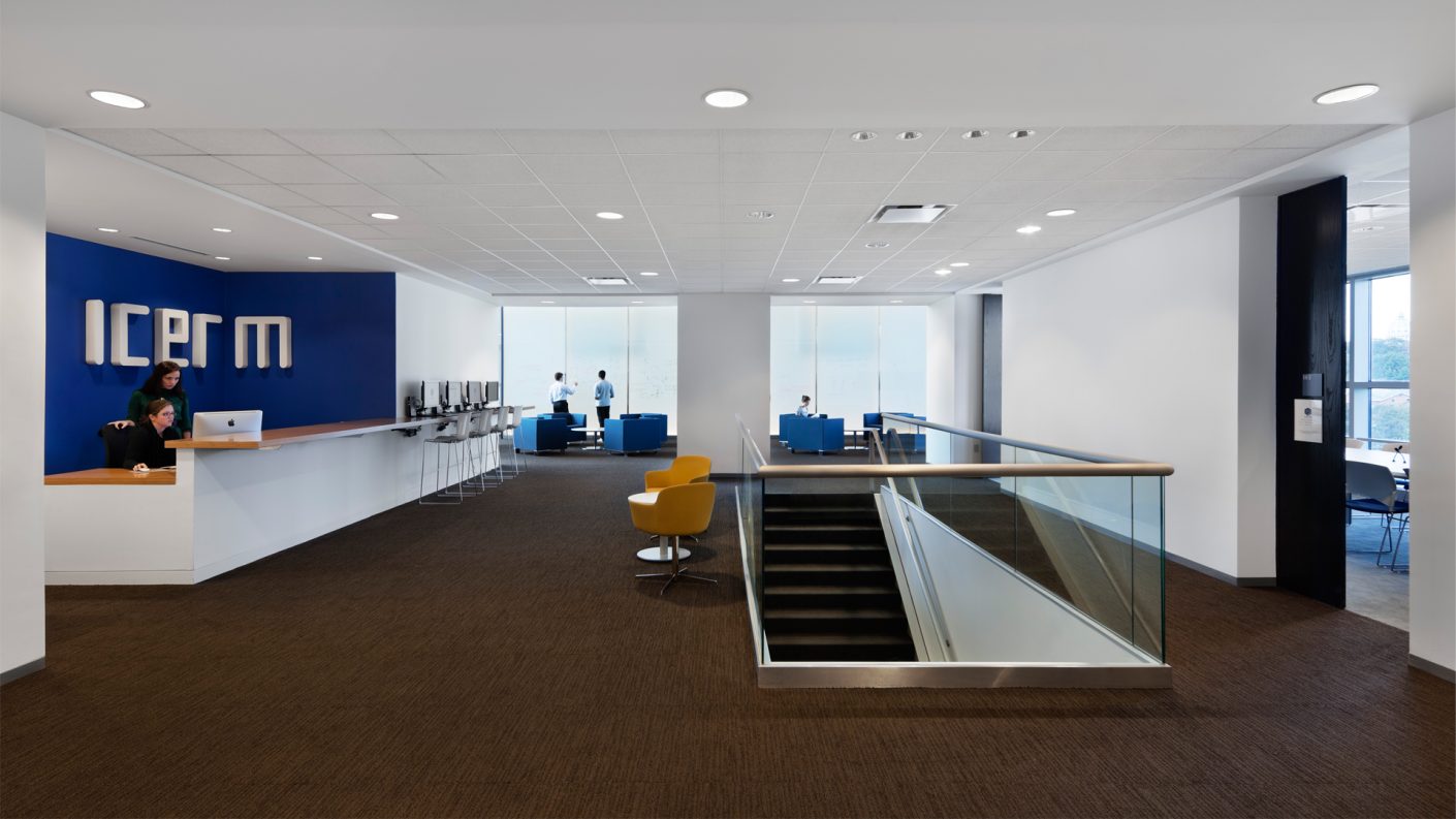 wide ICERM lobby with writable walls beyond and staircase descending below