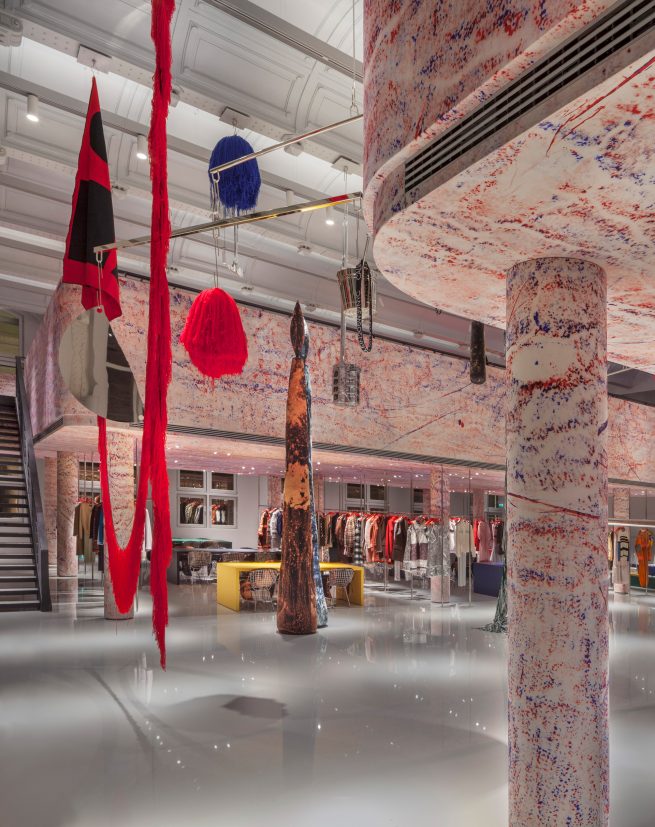 sterling ruby mobile and sculpture below a vaulte ceiling and between two opposite mezzanine levels