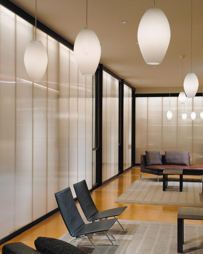 office sitting area surrounded by translucent walls