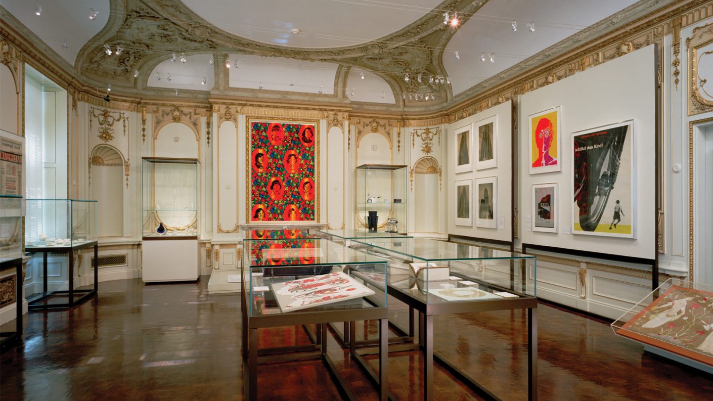 display cases in center of Victorian style Cooper-Hewitt gallery