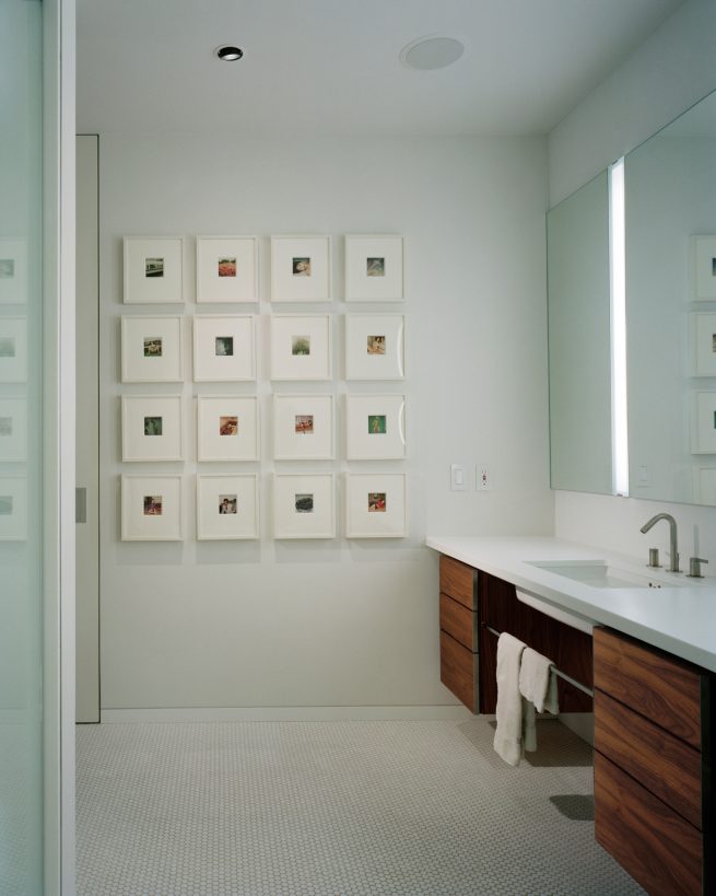 grid gallery wall in bathroom