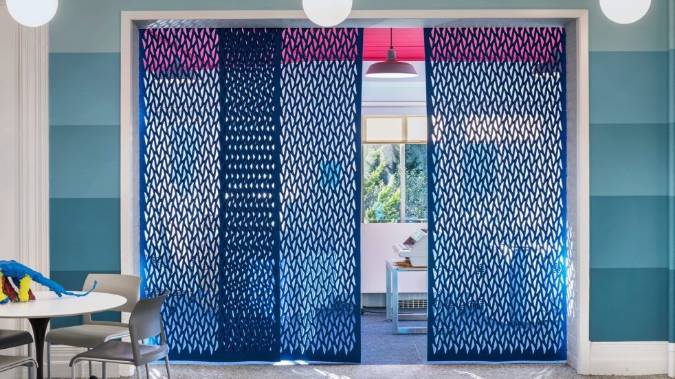 blue ARO Array separating two play spaces at Riverdale Country School's Junior Building