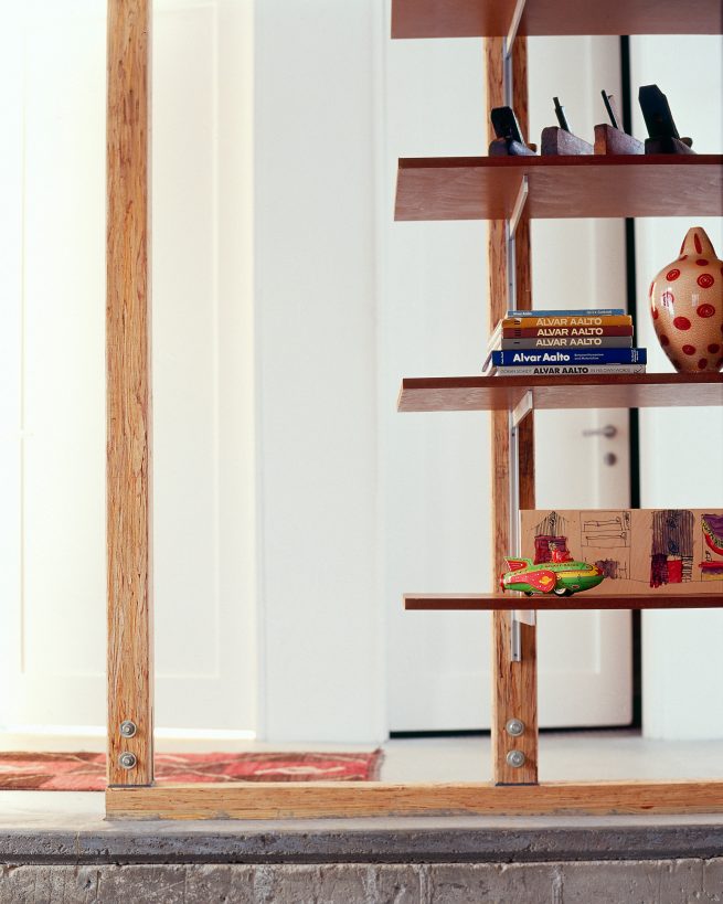 detail of minimalist wooden bookshelves