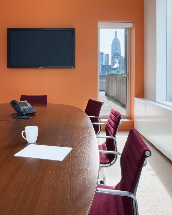 orange conference room with terrace access