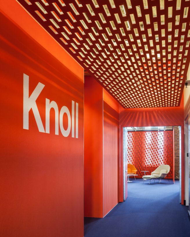 orange hallway with ceiling of ARO Array and graphic that reads Knoll on the wall