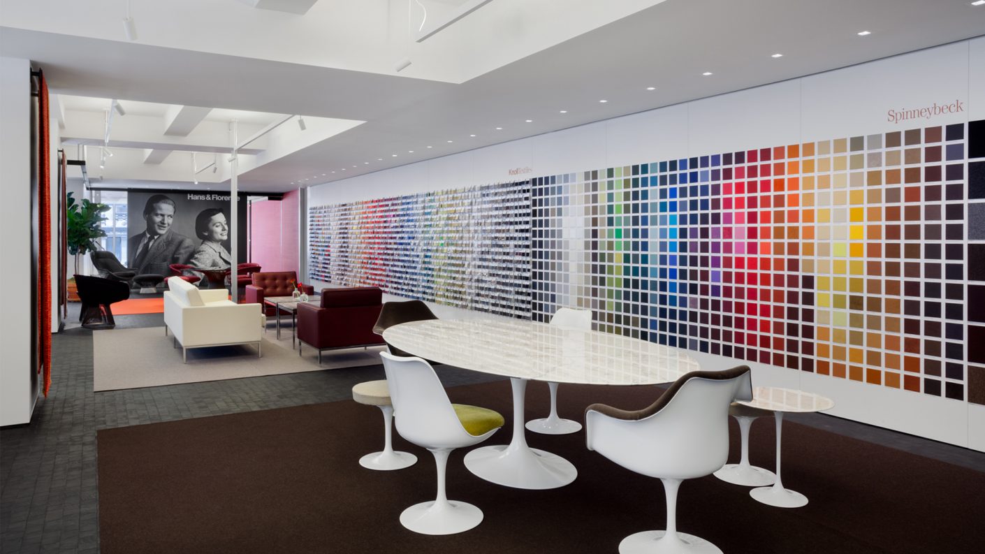 tables and seating along the colorful long Knoll textile wall