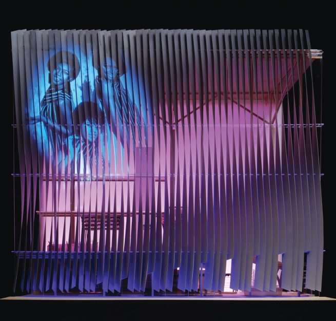 picture of The Supremes projected onto Motown Center façade