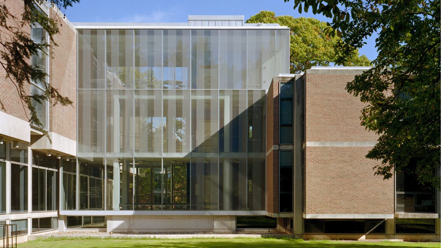 Glazed Princeton School of Architecture three story addition on a sunny day