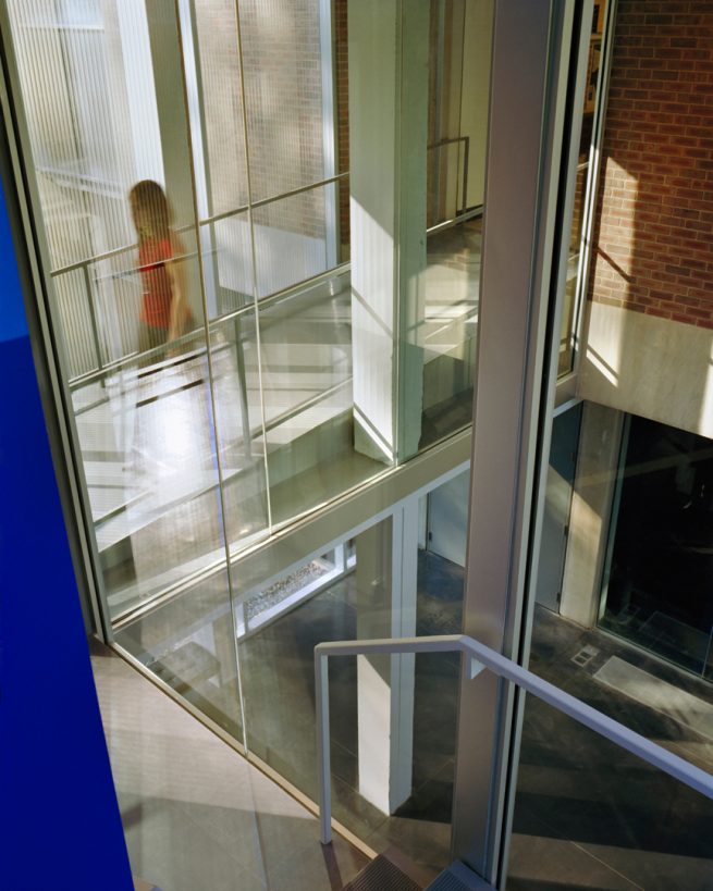 student passing through walkway