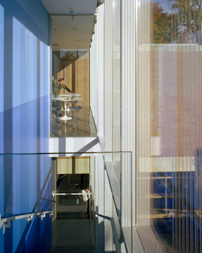 staircase landing looking to third floor lounge and fritted glass on the right