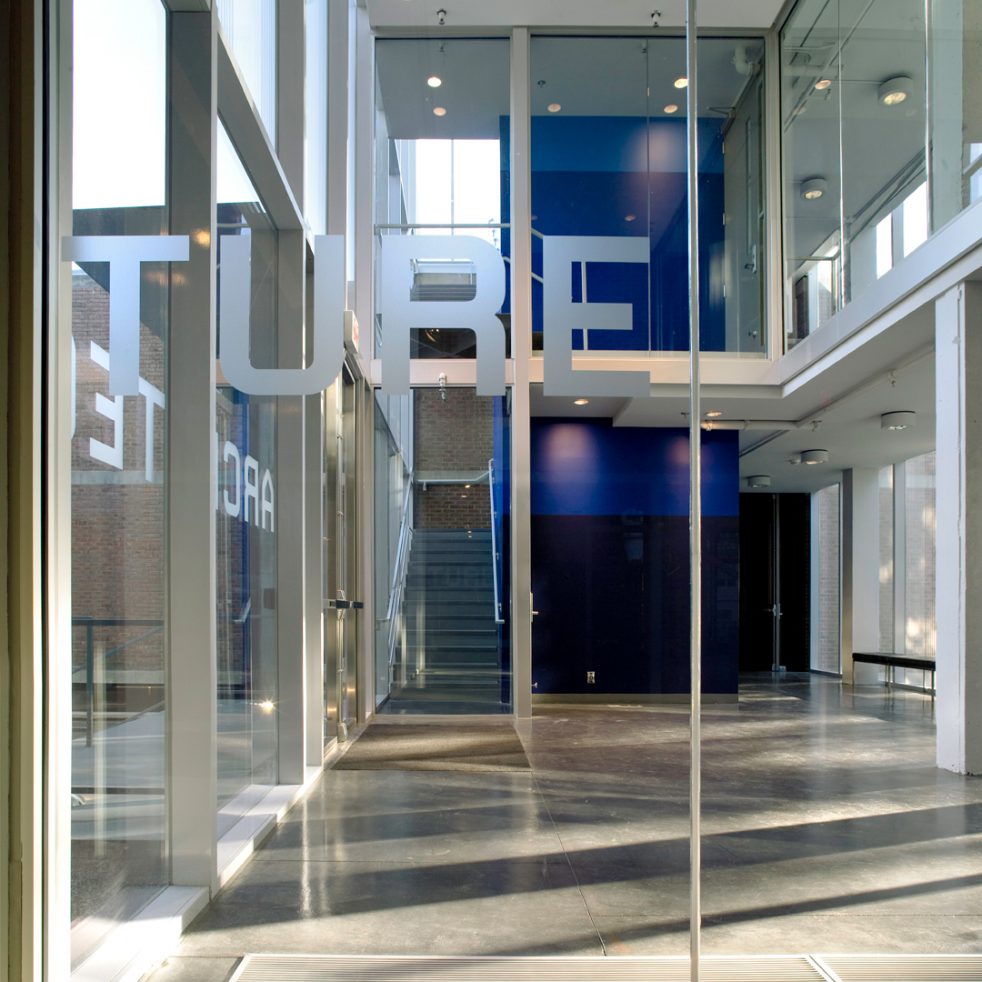 double height lobby and stair through the entry glass