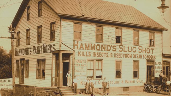 workers outside the barn in its original 1860 use