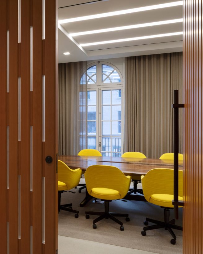 wooden door of conference room opened