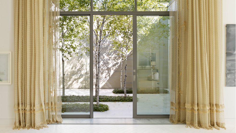 curtains flanking interior courtyard