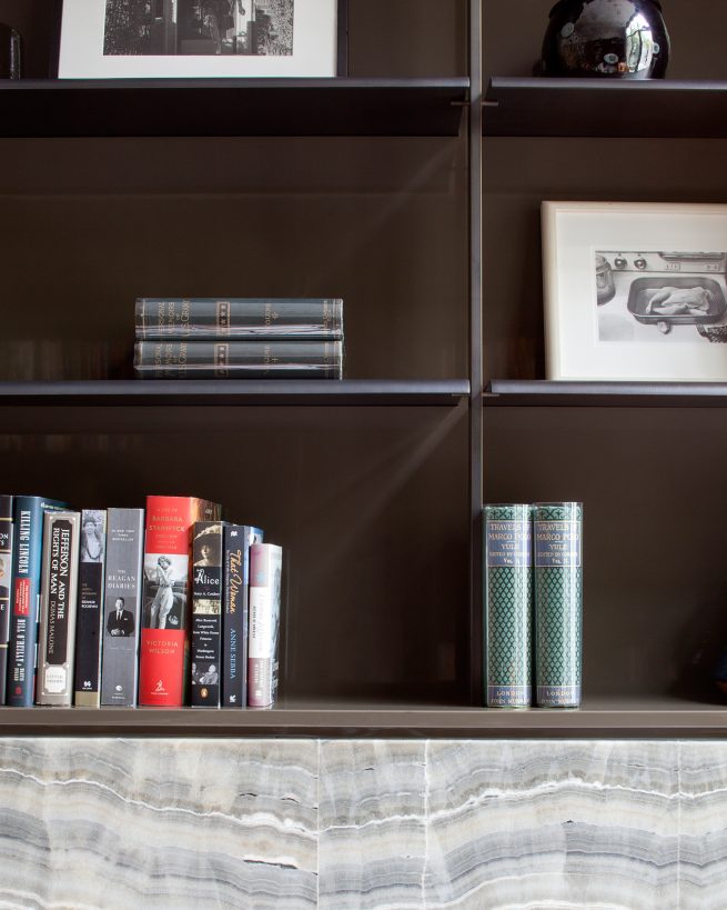 detail of study area with books on a shelf