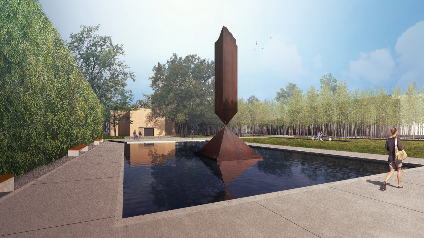 woman passes reflecting pool with the Broken Obelisk and the Rothko Chapel beyond