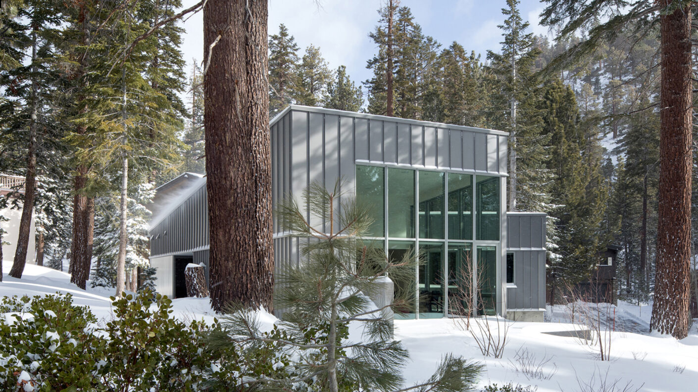 Mammoth House surrounded by trees and snow