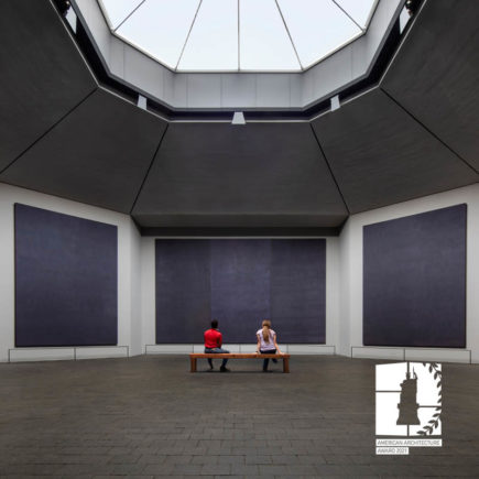 Visitors sitting in the restored Rothko Chapel
