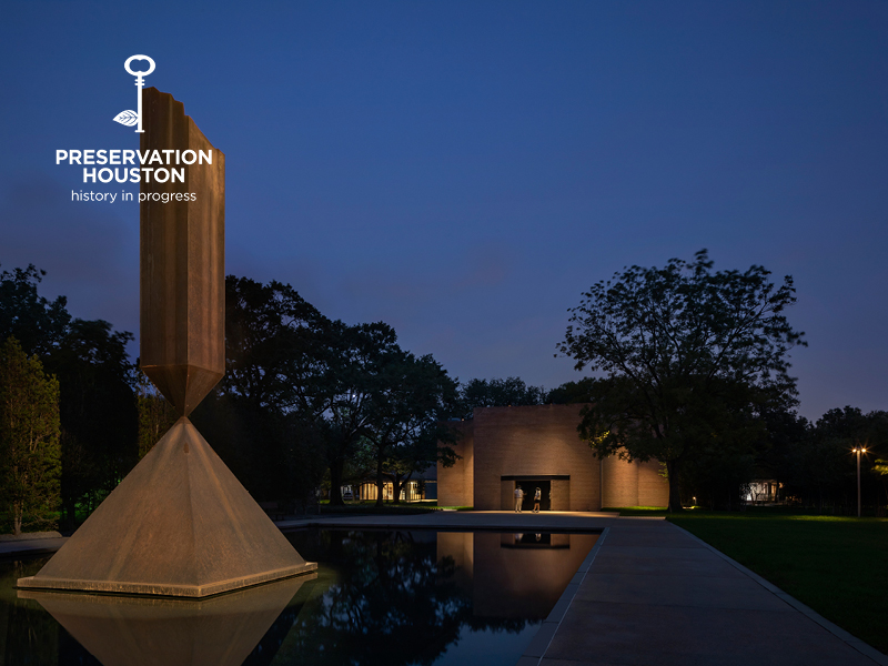 Rothko Chapel at dusk with Broken Obelisk in the foreground