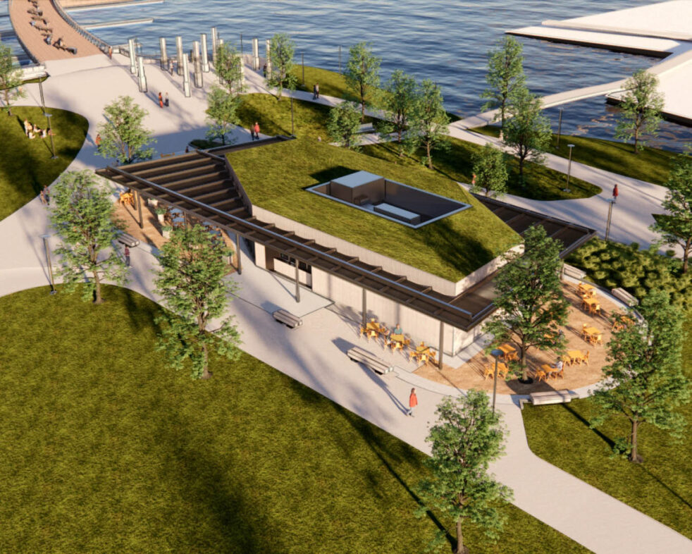 Aerial rendering of a one story building with a green-roof on the water