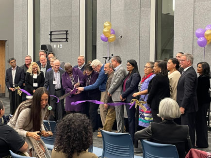 University of Washington leaders cut the ribbon on Milgard Hall, inside the new HIPs space
