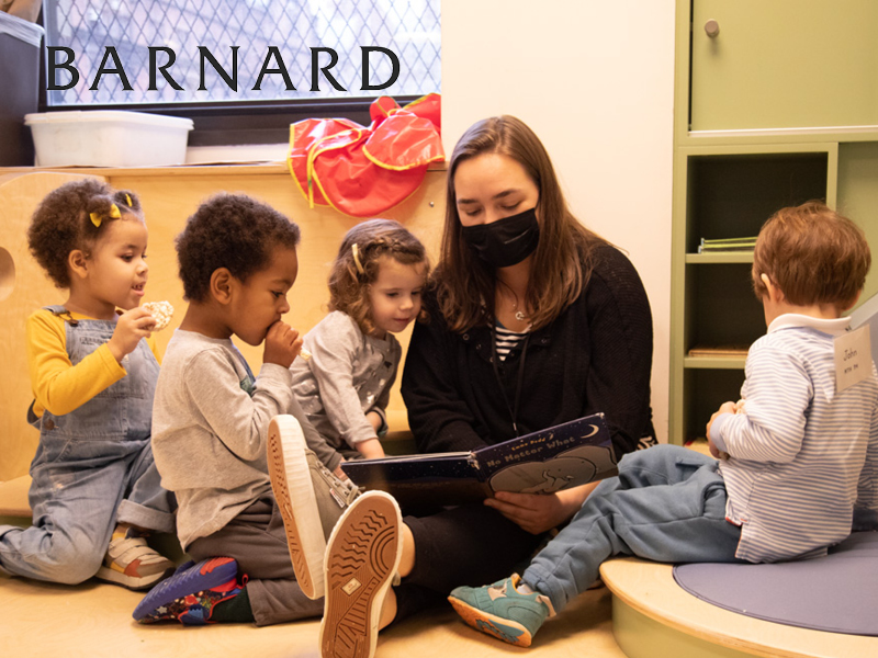 Student researcher reading with toddlers in the new Barnard Center for the Study of Child Development