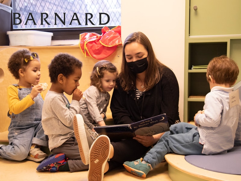 Student researcher reading with toddlers in the new Barnard Center for the Study of Child Development