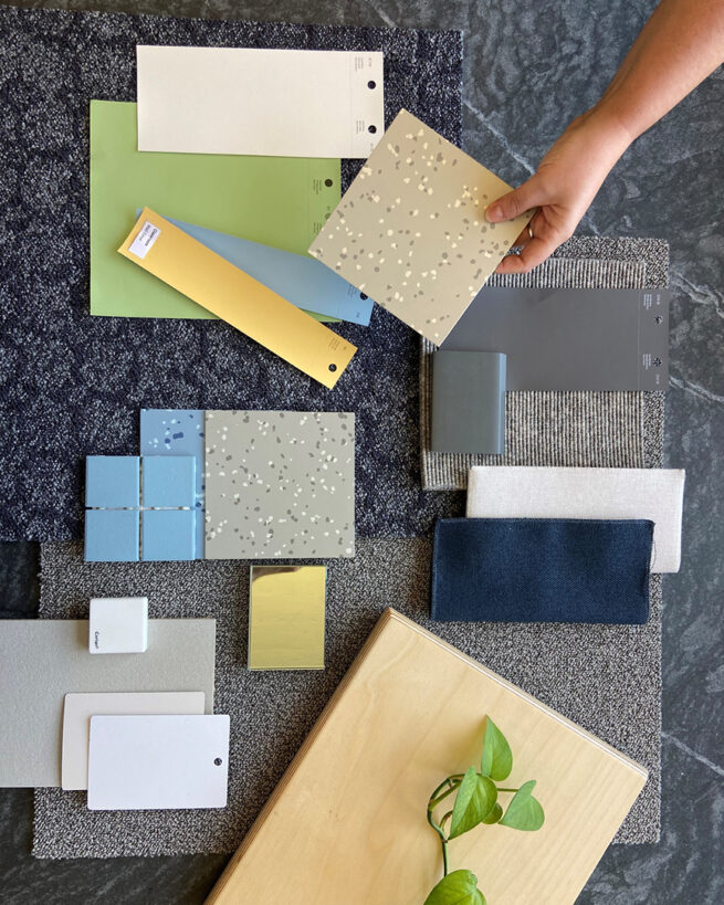 Photo of the material palette for Barnard's Center for the Study of CHild Development showing samples for paint, flooring, carpeting, and countertops