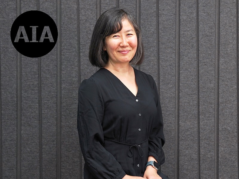 Portrait of Megumi Tamanaha against a gray background