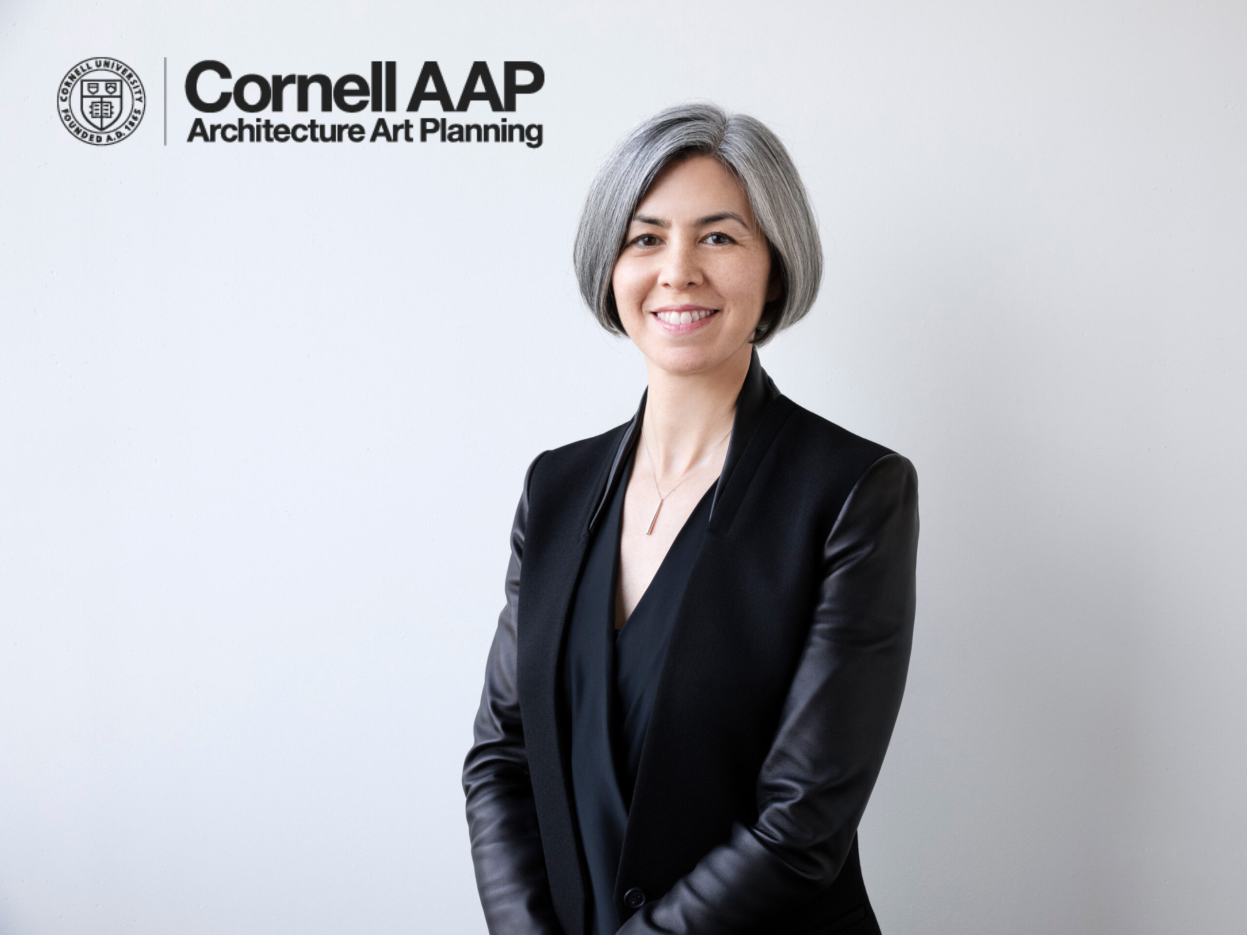Headshot ot Kim Yao against white background with Cornell AAP logo in top left corner