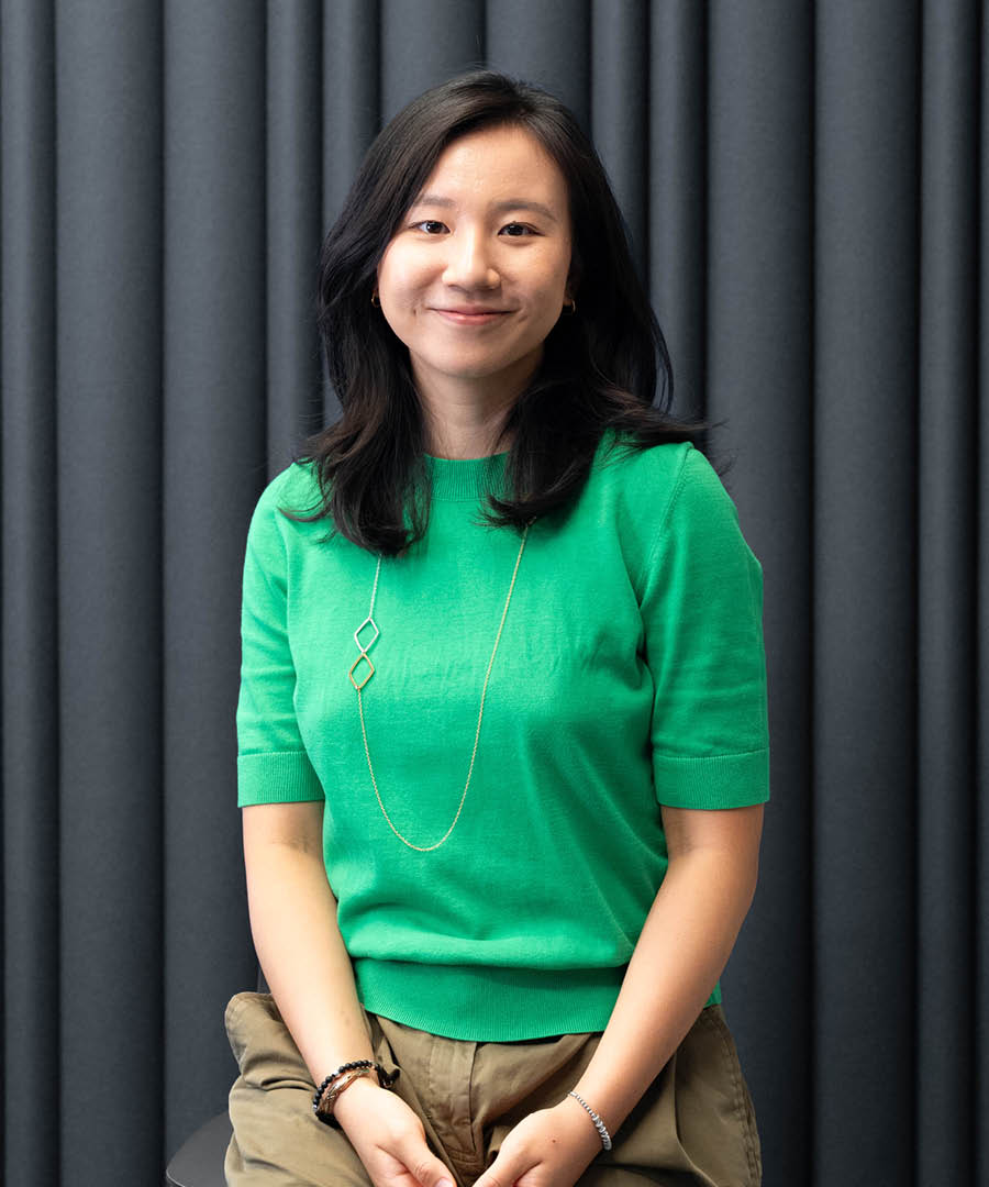 Portrait of woman in a green shirt